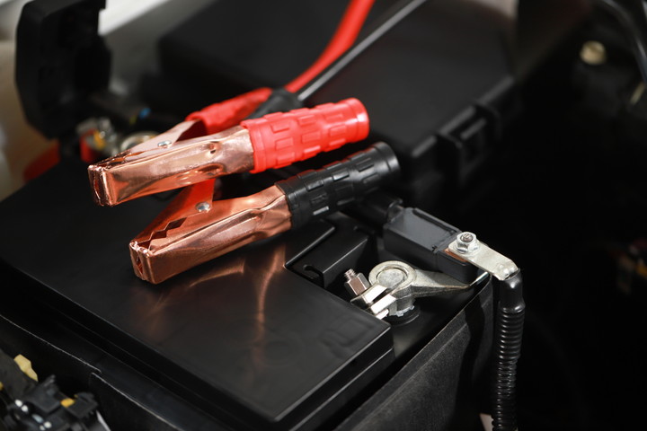 Safely charge the car battery with positive-negative terminals.