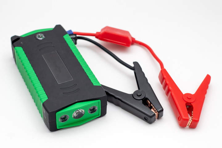 Emergency charger booster for car. Portable car jump starter.